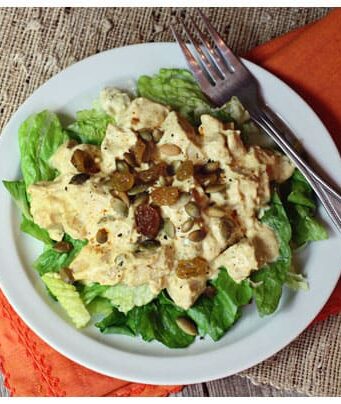 This chicken curry salad on lettuce is easy, healthy, and a delicious spin on traditional chicken salad.