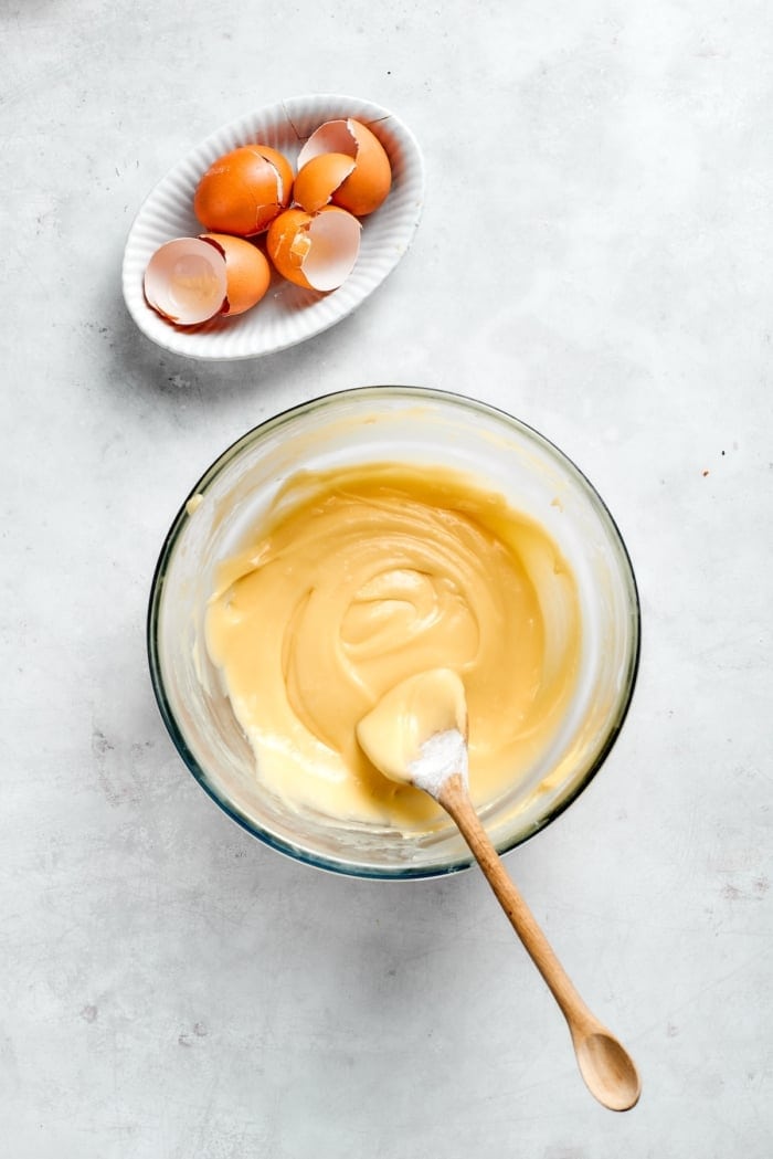 Overhead view of choux pastry dough in bowl