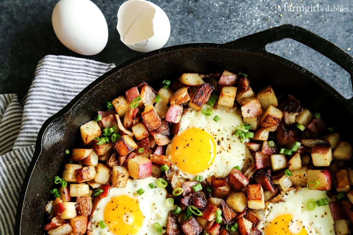 Skillet Baked Eggs with Potatoes and Bacon - Laughing Spatula