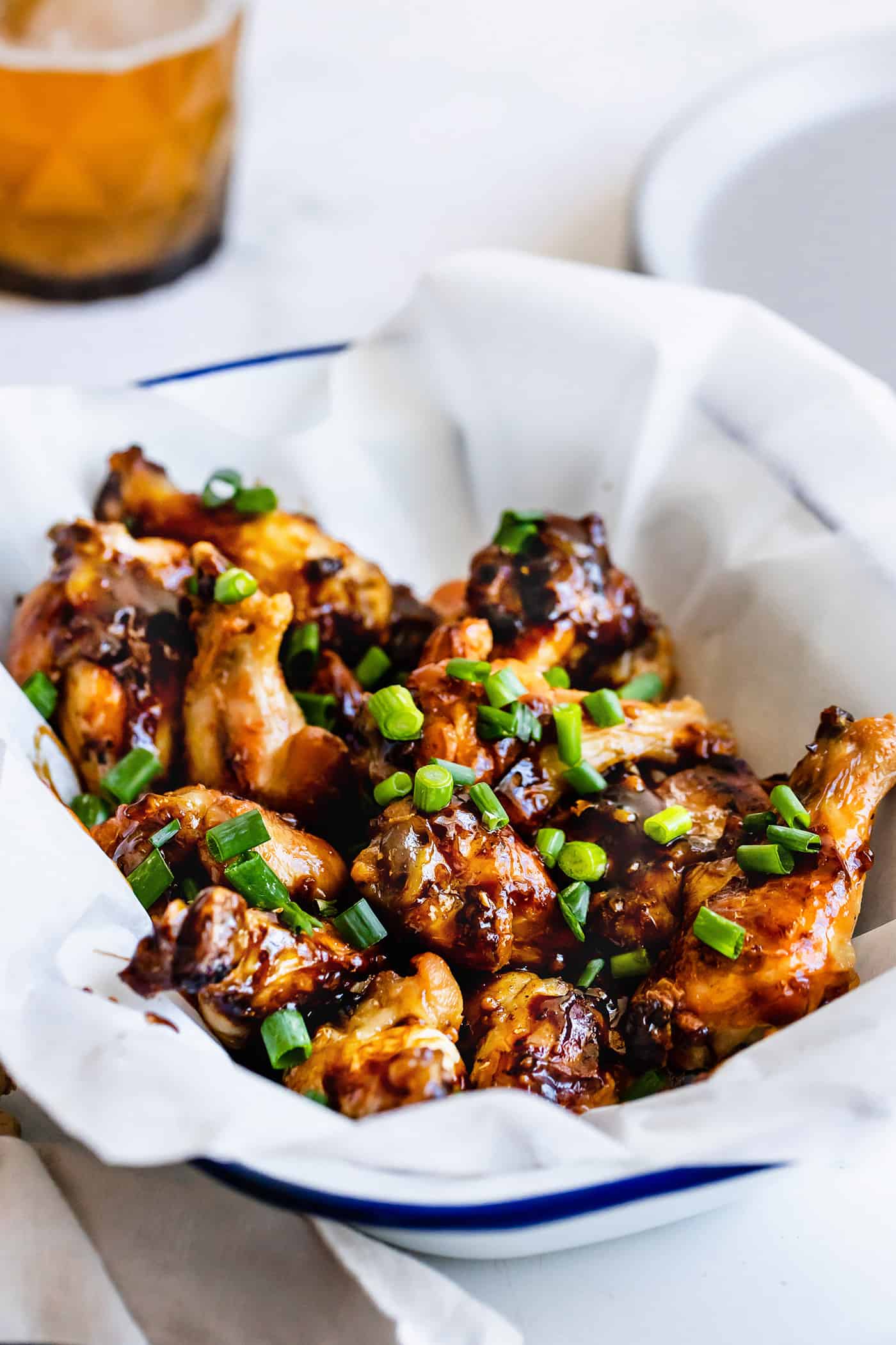 a tray of crispy baked chicken wings with oyster sauce