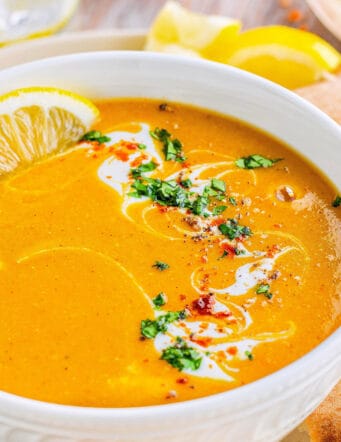 spicy lentil soup in a white bowl