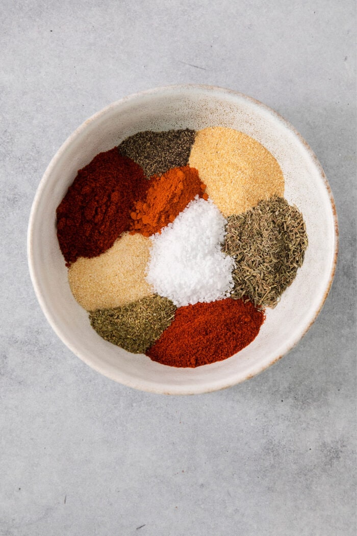 dried spices and herbs in a bowl
