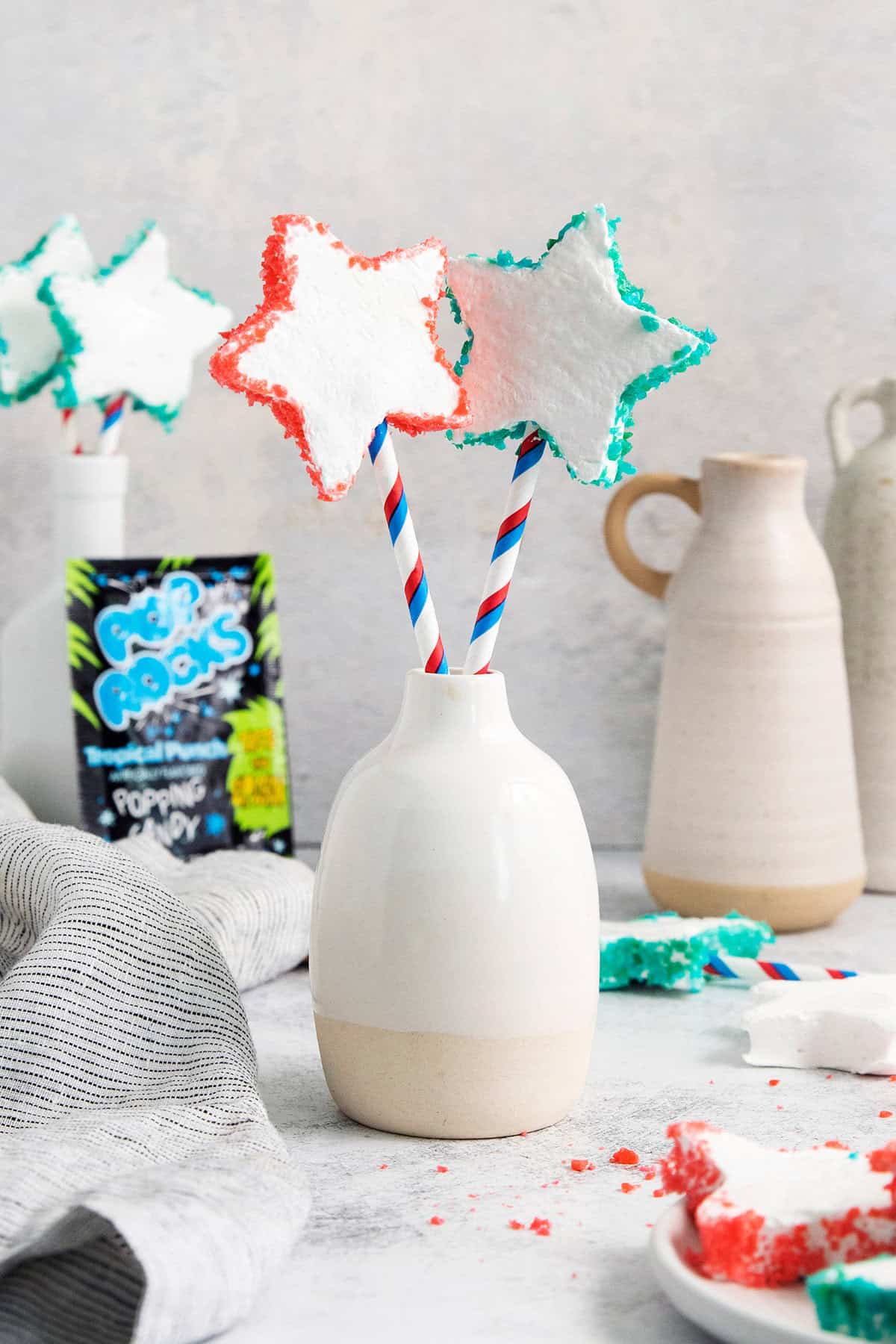 Patriotic Marshmallow Pops are displayed in a vase.